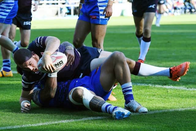 Leeds Rhinos' Cameron Smith scores his try. against Halifax Picture: Jonathan Gawthorpe.