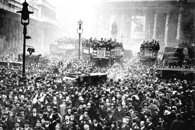 A huge crowd gathered outside the Stock Exchange and the Bank of England in London after the announcement of the Armistice, which heralded the end of the First World War.