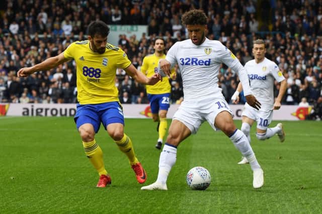 Leeds United's Tyler Roberts takes on Birmingham's Maxime Colin.