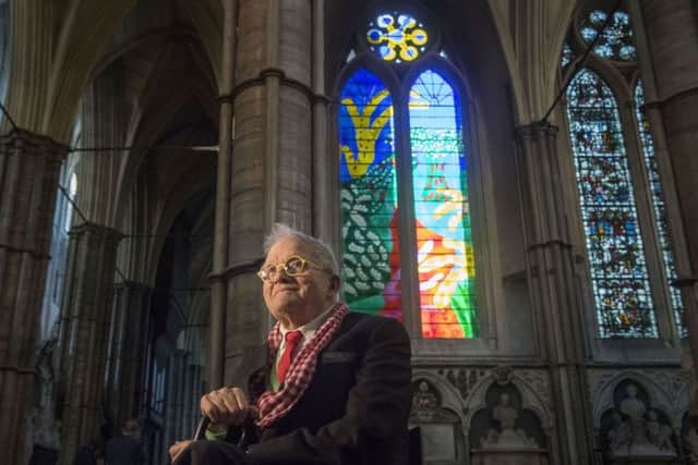 David Hockney in front of The Queen's Window, a new stained glass window at Westminster Abbey he designed and which was created by Barley Studio York, is revealed for the first time.  PIC: PA