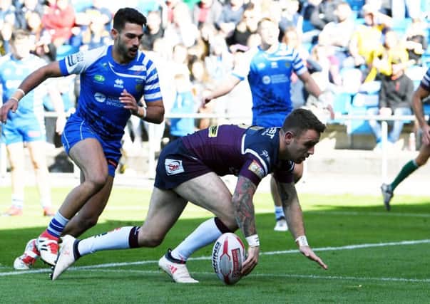 Richie Myler scores the opening try against Halifax.