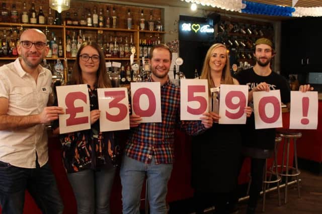 CHEERS!: North Bar staff have raised more than £30,000 for St Gemma's Hospice in Leeds.