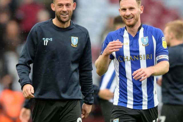 Sheffield Wednesday defender Tom Leeds (R) and Steven Fletcher (L) celebrate at Aston Villa.