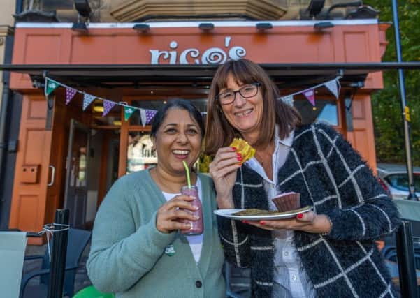 TEAM WORK: Bubbly Kaur, who credits a change in diet for helping keep her alive until now, with Ricos restaurant owner Heather Bozzo.