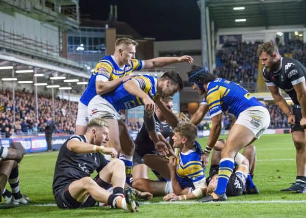 Leeds' Jimmy Keinhorst is congratulated on scoring a try against Toronto in his final game in the blue and amber.