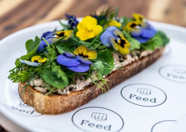 Crab tartine, soft herb salad and bisque butter. PIC: James Hardisty