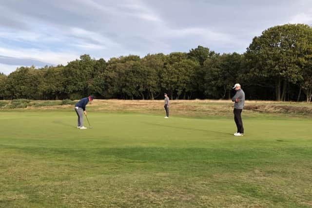 Alwoodley's Will Shucksmith putts on his home course on day one of the North of England championship (Picture: Jack Backhouse).