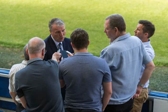 Gary Hetherington meets the media following the sacking of Brian McDermott.