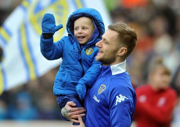 Leeds United captain Liam Cooper with Toby Nye ahead of the club's home tie v Millwall in January.