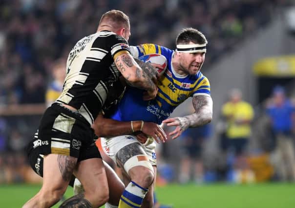 Betfred Super League.
Hull Fc v Leeds Rhinos.
Rhinos Brett Delaney is tackled by Hull's Mickey Paea and Josh Griffin.
19th April 2018.
Picture Jonathan Gawthorpe
