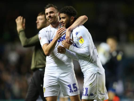Leeds United's Stuart Dallas (left) and Tyler Roberts (right) celebrate.