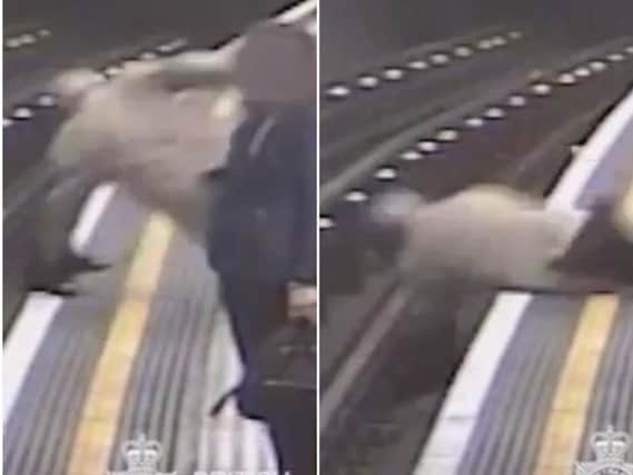 The man is shoved onto the underground tracks. Photo: British Transport Police