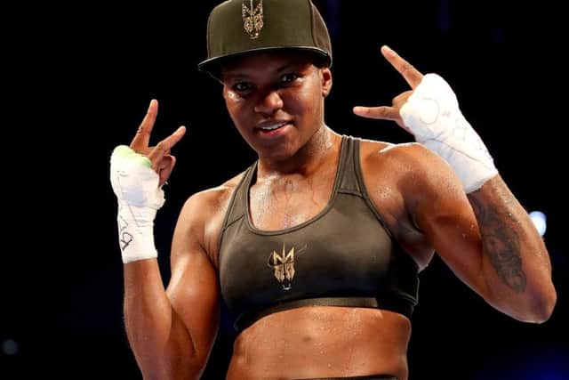 Nicola Adams celebrates after victory in her Interim WBO world  flyweight title fight against Isabel Millan.