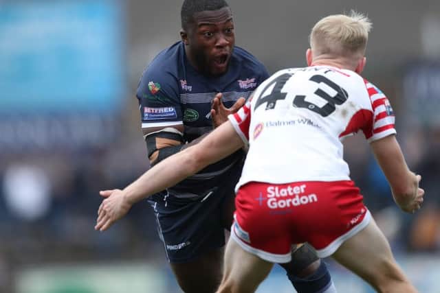 Featherstone's 
Muizz Mustapha takes on Leigh's Sam Grant in Sunday's Betfred Championship Shield Final at The LD Nutrition Stadium. PIC: John Clifton