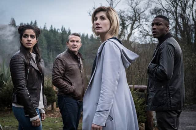Mandip Gill as Yaz, Bradley Walsh as Graham, Jodie Whittaker as The Doctor, Tosin Cole as Ryan.