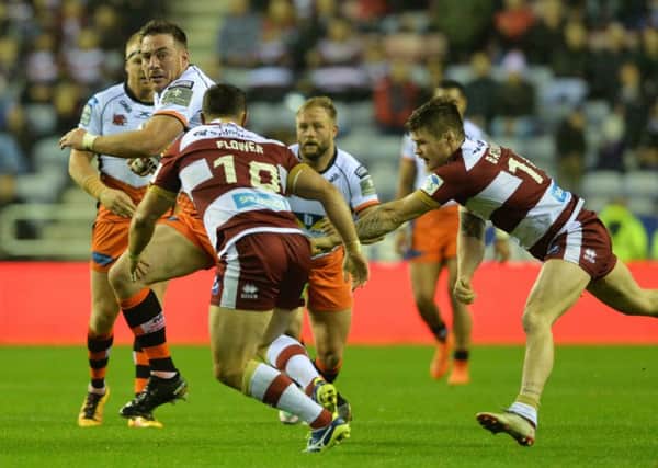 Castleford Tigers forward Grant Millington taking on the Wigan defence during Friday's play-off semi-final. PIC: Bruce Rollinson