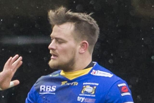 Picture by Allan McKenzie/YP - 22/02/15 - Sport - Rugby League - Kingstone Press Championship - Doncaster RLFC v Featherstone Rovers - Keepmoat Stadium, Doncaster, England - Doncaster's Mike Emmett is congratulated on scoring.