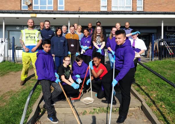 Leeds East Academy students clean up the row of shops on South Parkway, Seacroft, Leeds 10th October 2018 ..Picture by Simon Hulme