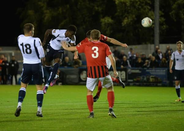 Kayode Odejayi gets in a header.  Picture Bruce Rollinson