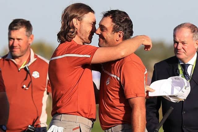 'MOLIWOOD': Francesco Molinari and Tommy Fleetwood, left, celebrate victory on day two of the Ryder Cup in Paris. Picture: Gareth Fuller/PA