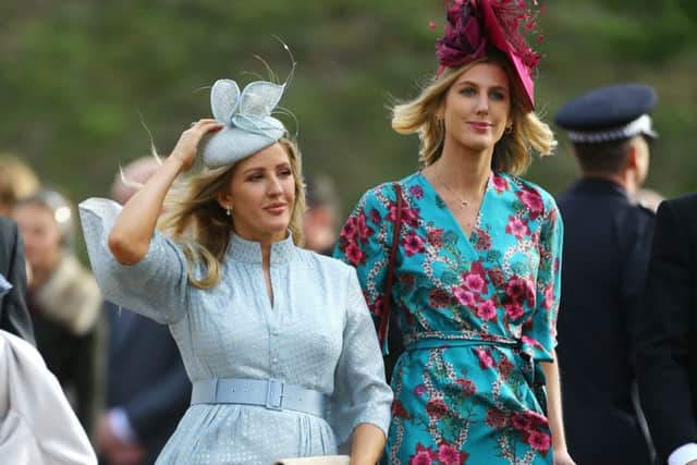 Ellie Goulding (left) arrives ahead of the wedding of Princess Eugenie to Jack Brooksbank. PIC: PA