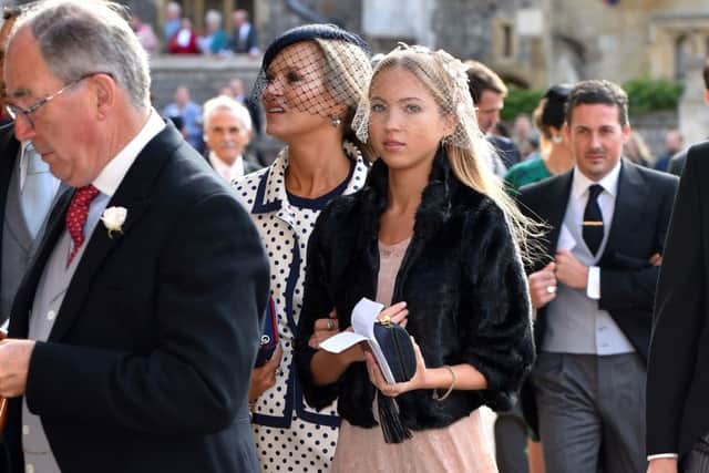 Kate Moss and Lila Grace Moss Hack (right) arrive for the wedding of Princess Eugenie to Jack Brooksbank. PIC: PA