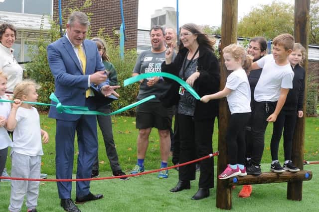 5 October  2018......    Stuart Andrew MP with PTA members and children with the new trim trail play equipment at Broadgate Primary School in Hoirsforth.  Picture Tony Johnson.