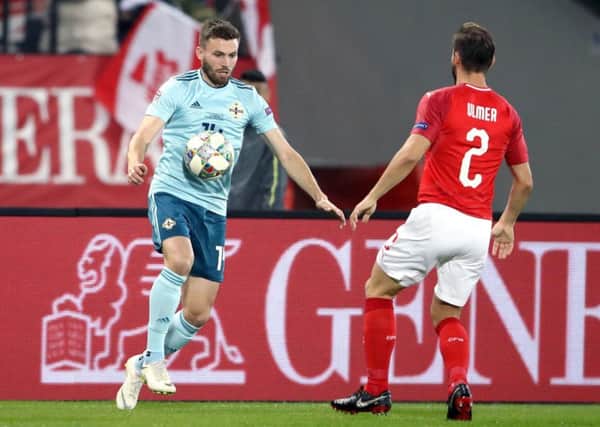 Northern Ireland's Stuart Dallas is challenged by Austria's Andreas Ulmer at the Ernst Happel Stadium, Vienna (Picture: John Walton/PA Wire).