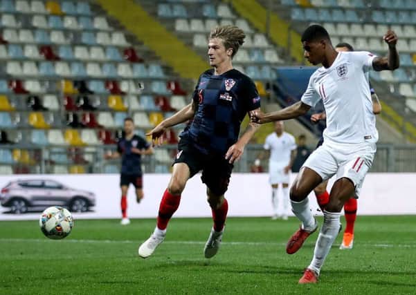 England's Marcus Rashford (right) has a chance on goal at Stadion HNK Rijeka. Picture: Tim Goode/PA