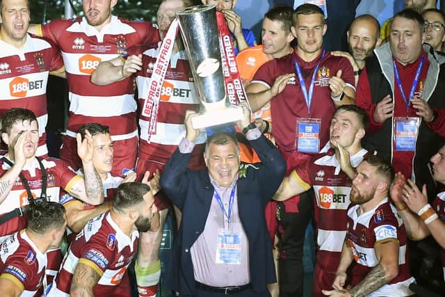 Wigan coach Shaun Wane celebrates the Grand FInal win with his players (SWPix)