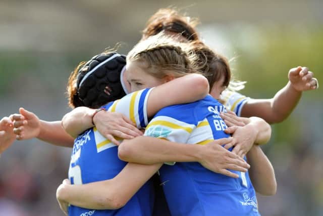 Caitlin Beevers celebrates her try in the Grand Final.