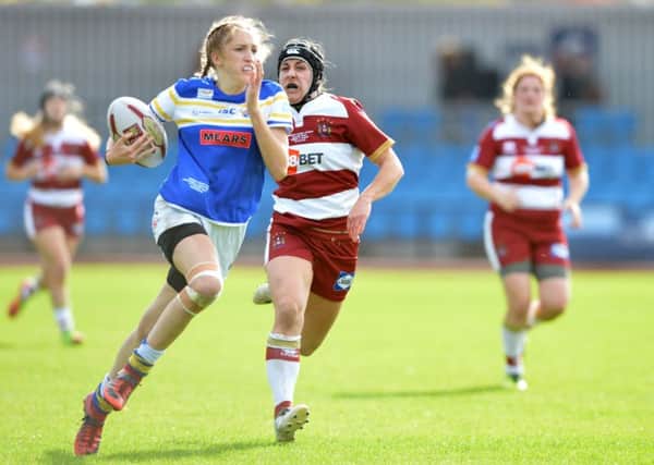 Caitlin Beevers runs through for Leeds Rhinos' second try against Wigan in the Grand Final.
