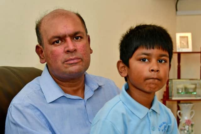 Asif Almas with his son Adam, five.