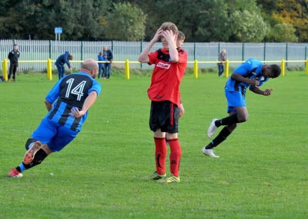 Despair for Ilkley Town after Akeel Francis, of Whitkirk Wanderers, made it 1-1. PIC: Steve Riding