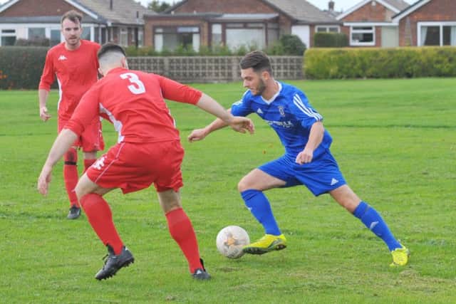 Colton's
Danny Coates takes charge. PIC: Steve Riding