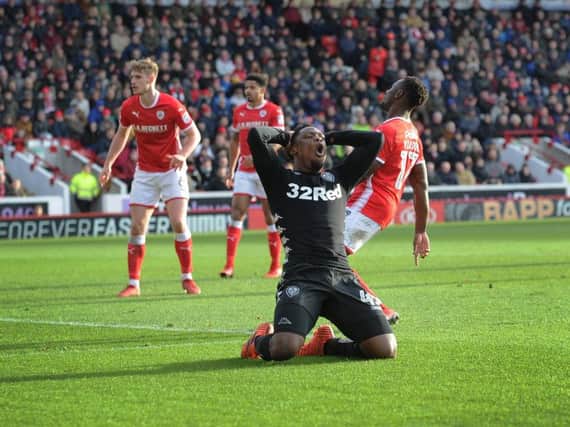 Caleb Ekuban holds his head in his hands after a missed chance in Leeds United's 2-0 win over Barnsley last season.