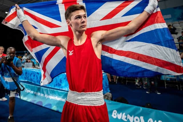 Great Britain's Hope Price celebrates as he took the Gold Medal in the Boxing Mens Fly (up to 52kg) at the Oceania Pavilion, Youth Olympic Park. (Picture: Simon Bruty/PA Wire)