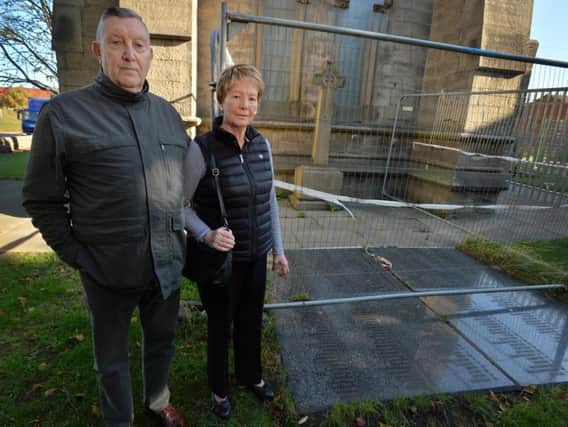 Peter Blower, pictured with his wife Hazel, at the war memorial at the St Mary the Virgin church grounds in Hunslet.