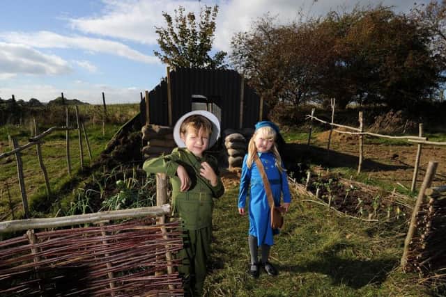 Charlotte Drummond and Seb Stacey are pictured by the Anderson Shelter at  Bardsey School, Bardsey19th October 2018 ..Picture by Simon Hulme