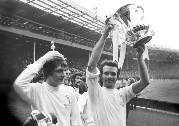 Paul Reaney lifting the FA Cup in 1972.