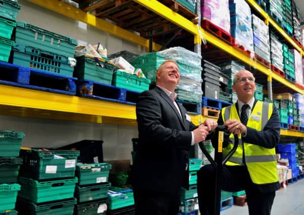 Gareth Batty, (left) chief Executive  FareShare Yorkshire, and  Leeds South and East with Lindsay Boswell Chief Executive FareShare Yorkshire   at  the FareShare Yorkshire  and Leeds South & East   warehouse in Leeds.