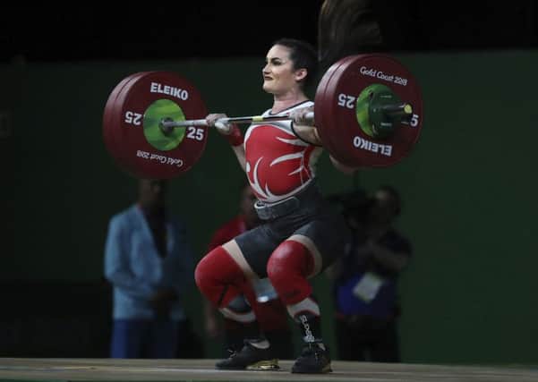 Leeds' Sarah Davies on her way to the silver medal in the  women's 69kg weightlifting final at the Commonwealth Games earlier this year.