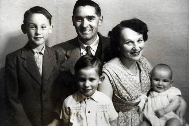 Winnie with her late husband, Charles, and children Andrew, Tony and Adrian.