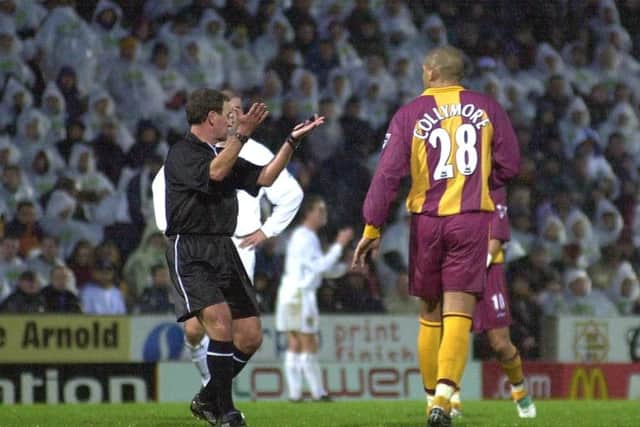 The referee has words with Bradford City's new signing Stan Collymore after his goal celebrations in front of the Leeds fans during the Premiership clash on Sunday, October 29, 2000 at Valley Parade. PIC: John Giles/PA Wire