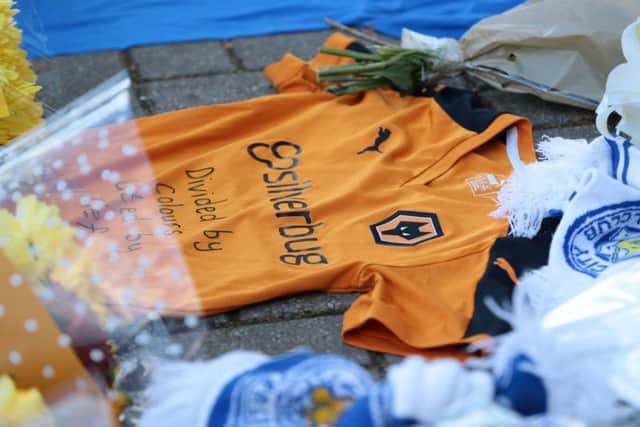 Tributes at Leicester City Foootbal Club following a helicopter used by club owner Vichai Srivaddhanaprabha, crashing into flames in a car park near the stadium shortly after 8.30pm on Saturday evening. Aaron Chown/PA Wire