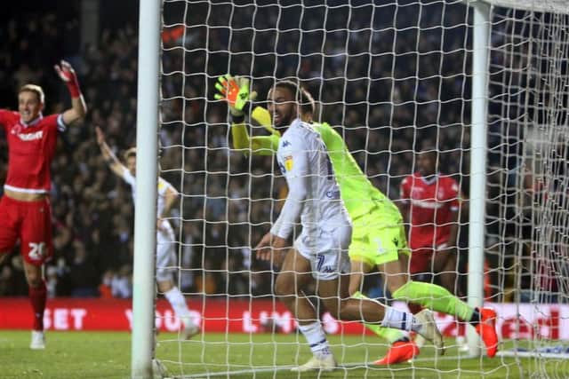 Leeds United's Kemar Roofe celebrates controversial late leveller against Nottingham Forest.