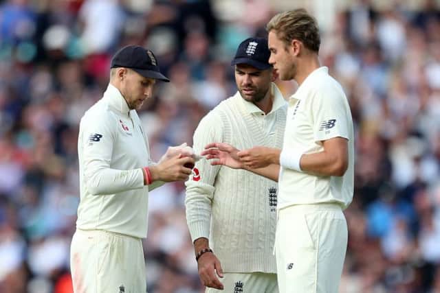 England's Joe Root (left), James Anderson (centre) and Stuart Broad. Picture: Steven Paston/PA