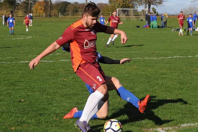 Bardsey's Jordan Deacey scores at Acorn (Bramley) FC. PIC: Steve Riding