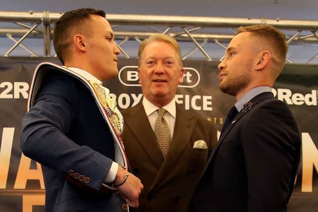 Josh Warrington (left) and next opponent Carl Frampton square up to each other. PIC: Steven Paston/PA Wire