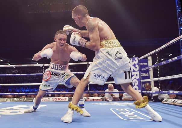 Josh Warrington stalks Lee Selby during their world-title fight at Elland Road Stadium in May. PIC: Steve Riding